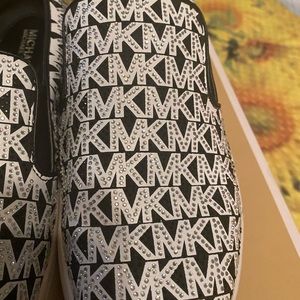 MK slippers